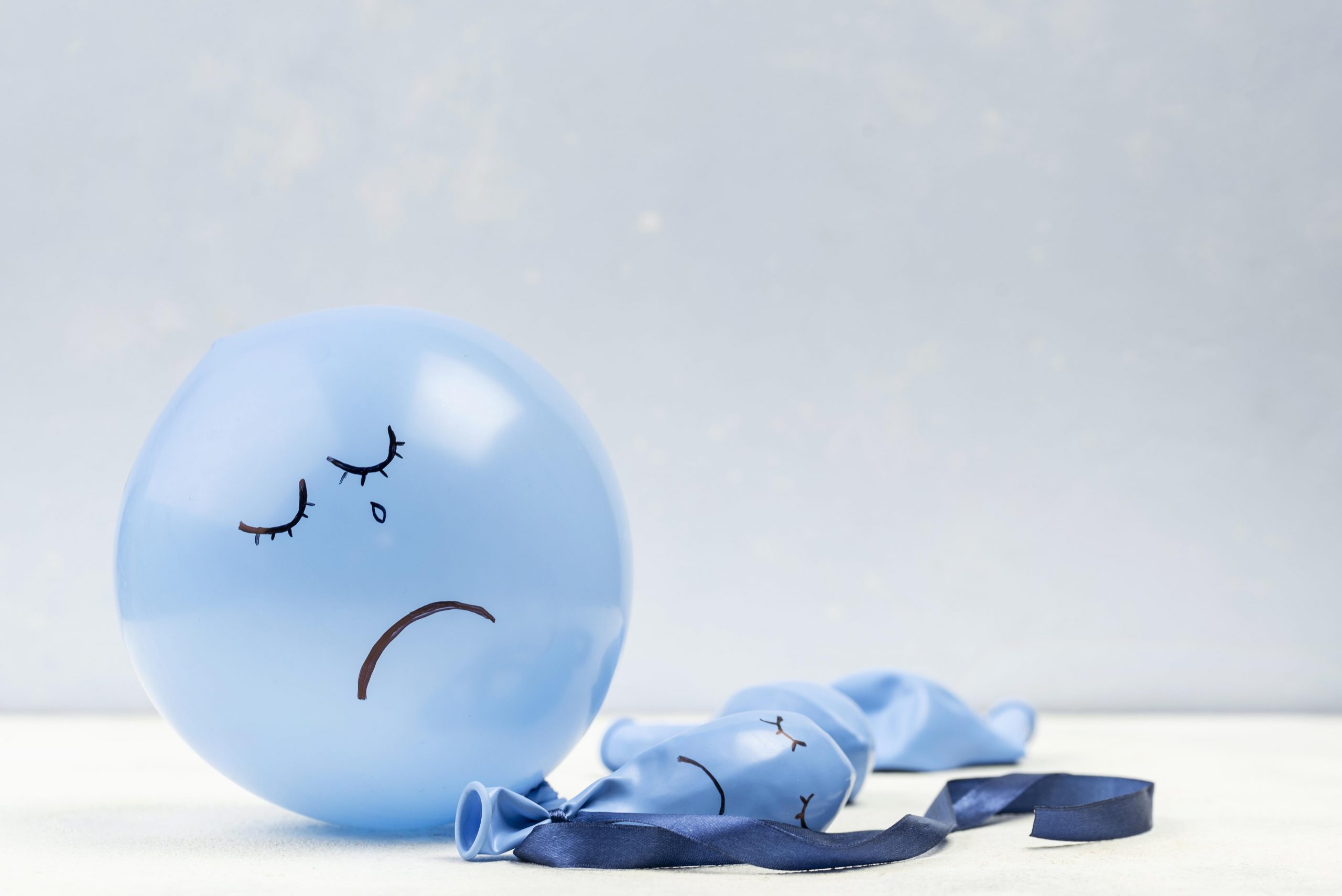 sad balloon with copy space blue monday